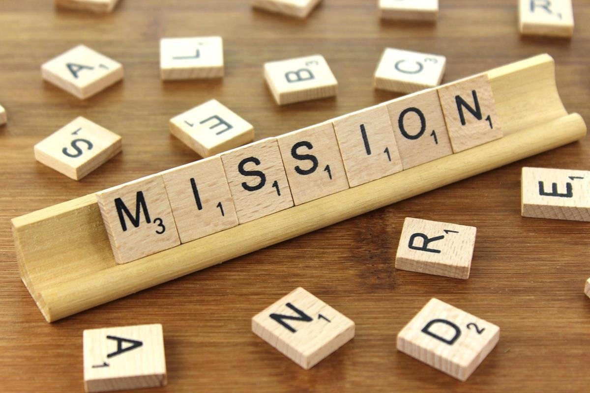 Scrabble tiles spelling the word mission